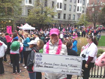 Elaine Talevi presented a check to the American Cancer Society for $15,000 in 2012 at the Breast Cancer Awareness Walk.